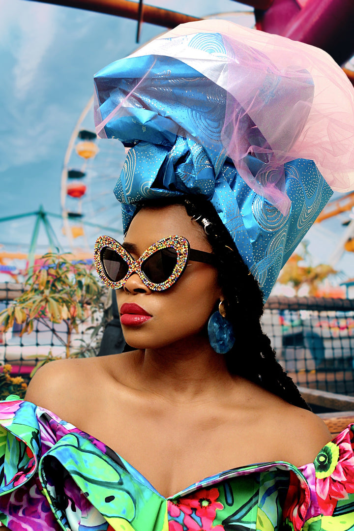 MODEL IN OVERSIZED CAT EYE SUNGLASSES